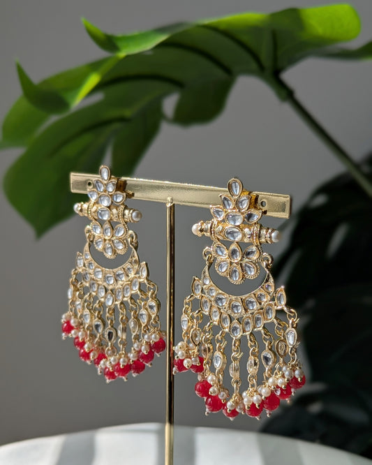 Traditional Kundan earrings featuring intricate stonework, pearl accents ideal for festive and wedding wear. Imitation jewelry. Pick-up in Ajax Ontario. Worldwide shipping available. Perfect for weddings, festival jewelry, indian Jewelry, kids jewelry, kundan jewelry, gifting, costume jewelry, fashion jewelry, Eid, onam, Diwali, karwachauth, navratri. Free shipping available. Jewelry for women. Indian jewelry in ajax durham toronto.