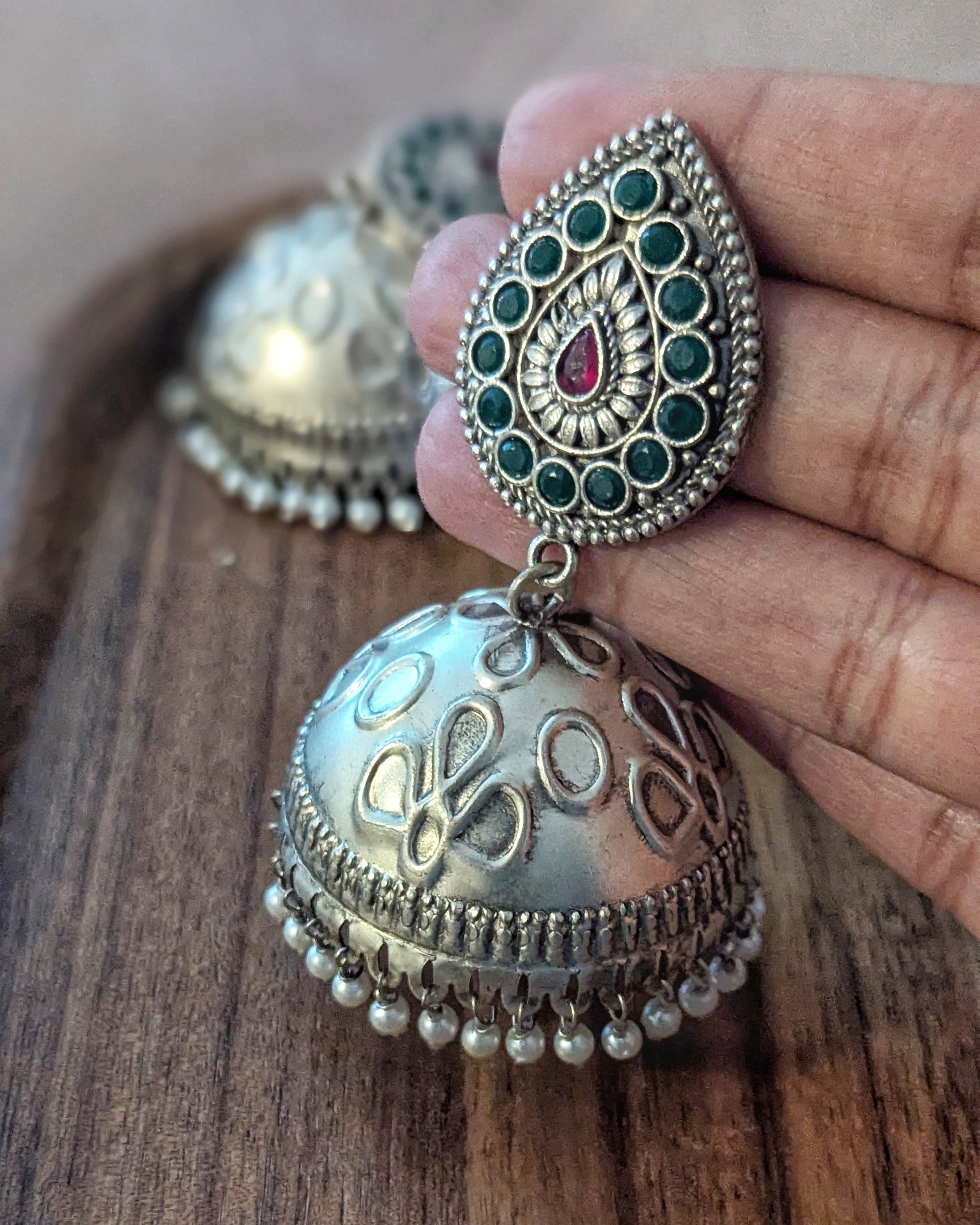 Oxidized Silver jhumkas with red green stones. Pick-up in Ajax Ontario. Worldwide shipping available. Perfect for wedding, festival jewelry, indian Jewelry, kids jewelry, kundan jewelry, gifting, costume jewelry, fashion jewelry, Eid, onam, Diwali, karwachauth, navratri. Free shipping available. Jewelry for women. Indian jewelry in ajax durham region. Bollywood style jewelry.