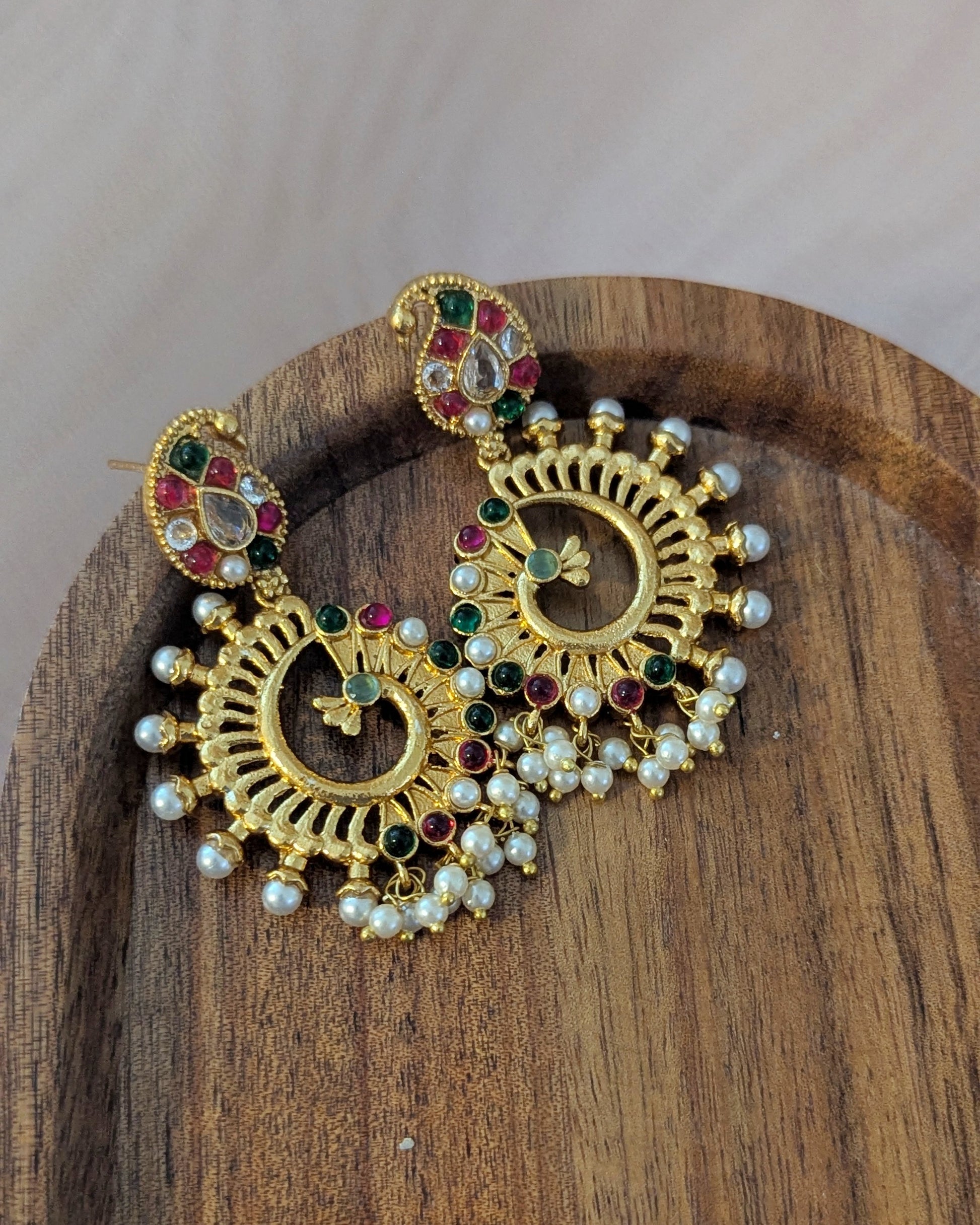 Gold earrings with pearls and gemstones. Pick-up in Ajax Ontario. Worldwide shipping available. Perfect for wedding, festival jewelry, indian Jewelry, kids jewelry, kundan jewelry, gifting, costume jewelry, fashion jewelry, Eid, onam, Diwali, karwachauth, navratri. Free shipping available. Jewelry for women. Indian jewelry in ajax durham region.