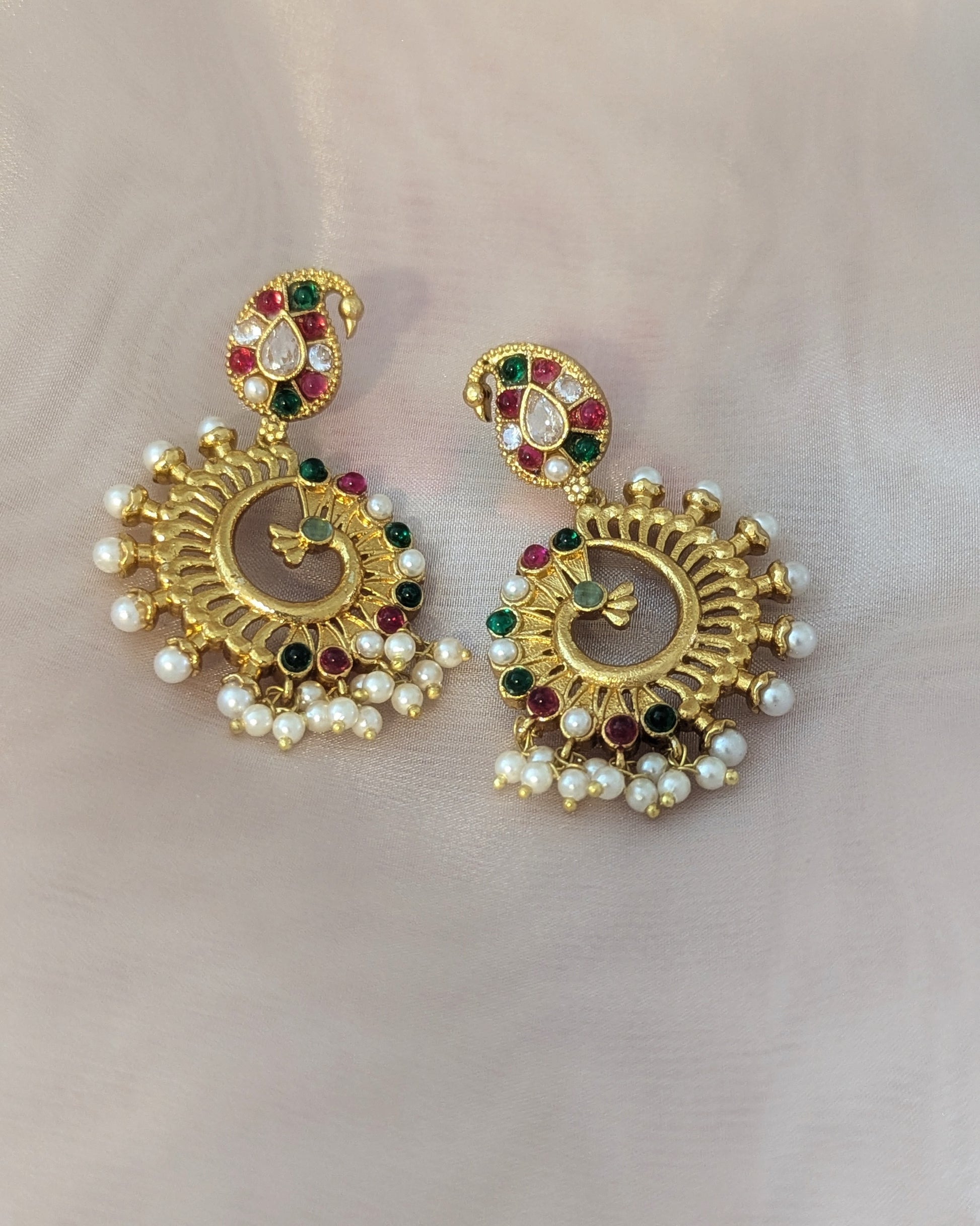 Gold earrings with pearls and gemstones. Pick-up in Ajax Ontario. Worldwide shipping available. Perfect for wedding, festival jewelry, indian Jewelry, kids jewelry, kundan jewelry, gifting, costume jewelry, fashion jewelry, Eid, onam, Diwali, karwachauth, navratri. Free shipping available. Jewelry for women. Indian jewelry in ajax durham region.