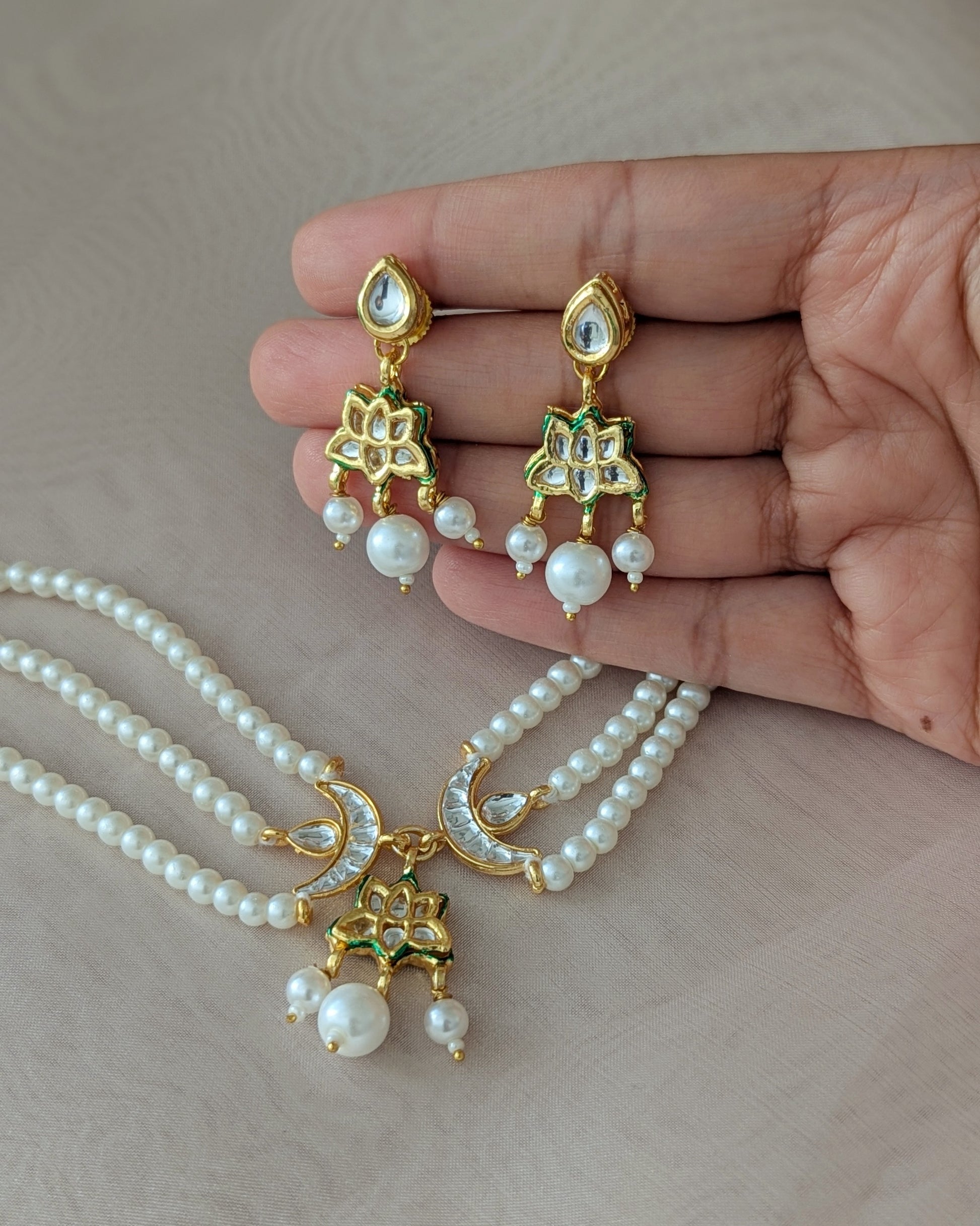 Premium and unique pearl choker/chokar necklace with unique chaand design. Comes with matching earrings. Pick-up in Ajax Ontario. Worldwide shipping available. Perfect for wedding, festival jewelry, indian Jewelry, kids jewelry, kundan jewelry, gifting, costume jewelry, fashion jewelry, Eid, onam, Diwali, karwachauth, navratri. Free shipping available. Jewelry for women.