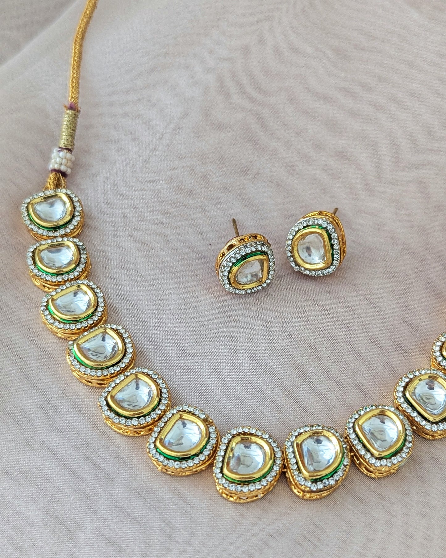 Statement Kundan choker/chokar necklace with back meenakari work and stud earrings with American diamond detailing. Pick-up in Ajax Ontario. Worldwide shipping available. Perfect for wedding, festival jewelry, indian Jewelry, kids jewelry, kundan jewelry, gifting, costume jewelry, fashion jewelry, Eid, onam, Diwali, karwachauth, navratri. Free shipping available. Jewelry for women.
