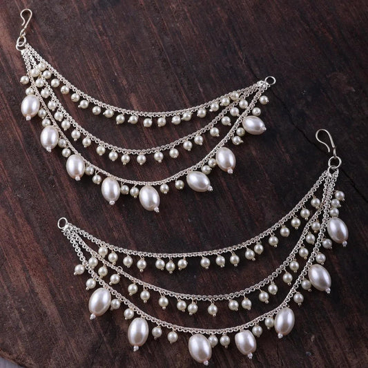 Bahubali inspired Earchain/kaan chain/sahare in silver with pearls. Pick-up in Ajax Ontario. Worldwide shipping available. Perfect for wedding, festival jewelry, indian Jewelry, kids jewelry, kundan jewelry, gifting, costume jewelry, fashion jewelry, Eid, Diwali, karwachauth, navratri. Free shipping available. Jewelry for women.