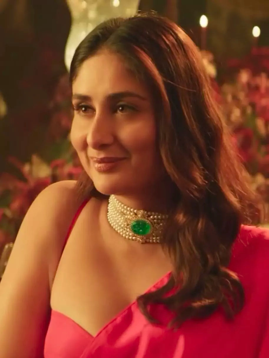 Bollywood inspired choker in white pearls and green stone in the middle. Comes with matching earrings.  Great to pair with suits, sarees and western outfits. Available at Sufna Canada in Ajax, Durham Toronto GTA OntarioAvailable at Sufna Canada in Ajax, Durham Toronto GTA Ontario, worldwide shipping.