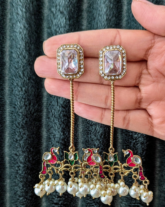 Beautiful bird design statement earrings in red, green color with white pearls. Perfect to match with any outfit or wear it as a contrast to a different color. Now available at Sufna Canada Ajax Ontario Toronto GTA