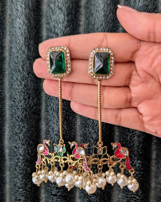 Beautiful bird design statement earrings in red, green color with white pearls. Perfect to match with any outfit or wear it as a contrast to a different color. Now available at Sufna Canada Ajax Ontario Toronto GTA