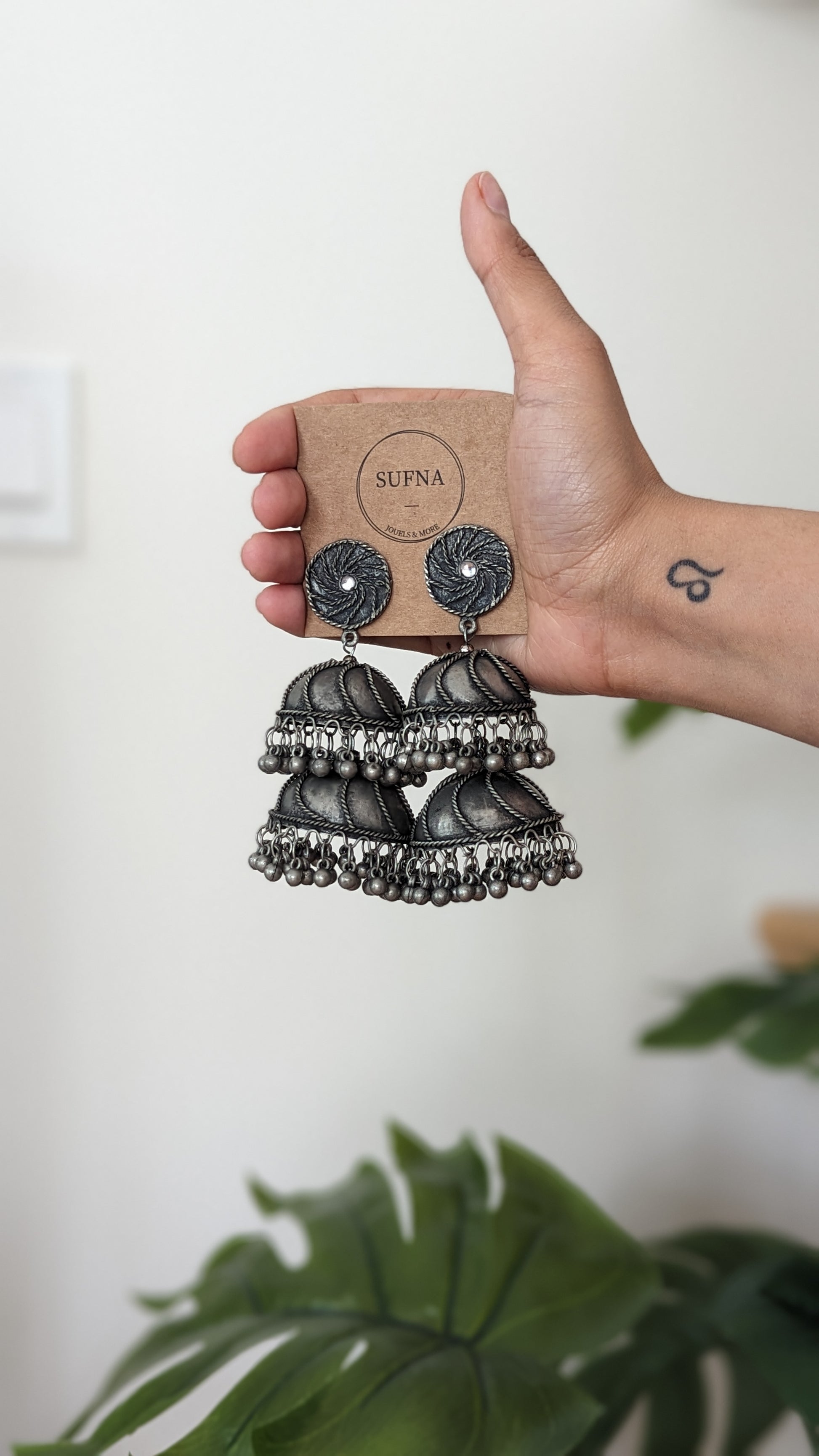 Make a bold statement with these silver chunky double layer oxidized silver jhumkas.