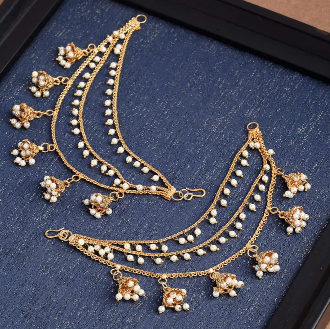 Statement baahubali inspired jhumka earchains in three layers. Pick-up in Ajax Ontario. Worldwide shipping available. Perfect for wedding, festival jewelry, indian Jewelry, kids jewelry, kundan jewelry, gifting, costume jewelry, fashion jewelry, Eid, onam, Diwali, karwachauth, navratri. Free shipping available. Jewelry for women.