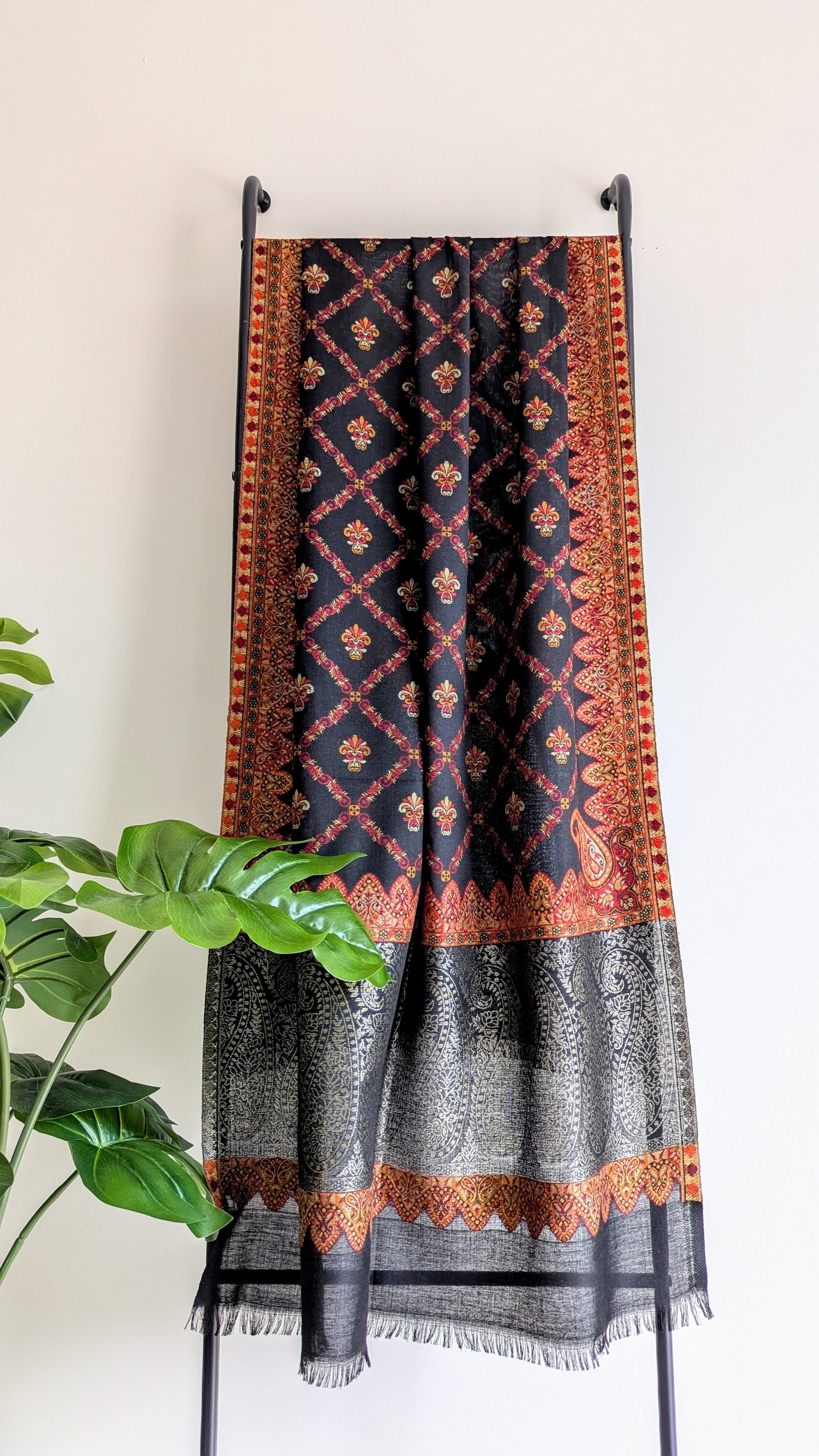 Handmade Pashmina shawls from Kashmir in kani design, very classy and warm black color with colorful work. Great gift for parents, mothers, mother in law (MIL). Very high quality shawl available in different sizes only at Sufna Canada