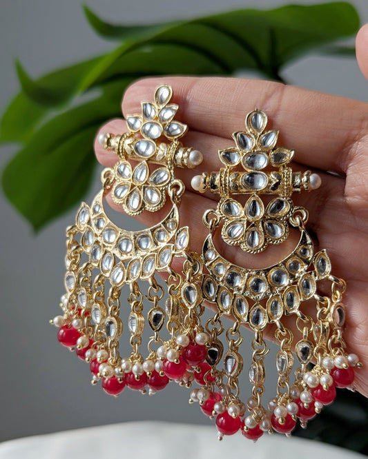 Traditional Kundan earrings featuring intricate stonework, pearl accents ideal for festive and wedding wear. Imitation jewelry. Pick-up in Ajax Ontario. Worldwide shipping available. Perfect for weddings, festival jewelry, indian Jewelry, kids jewelry, kundan jewelry, gifting, costume jewelry, fashion jewelry, Eid, onam, Diwali, karwachauth, navratri. Free shipping available. Jewelry for women. Indian jewelry in ajax durham toronto.