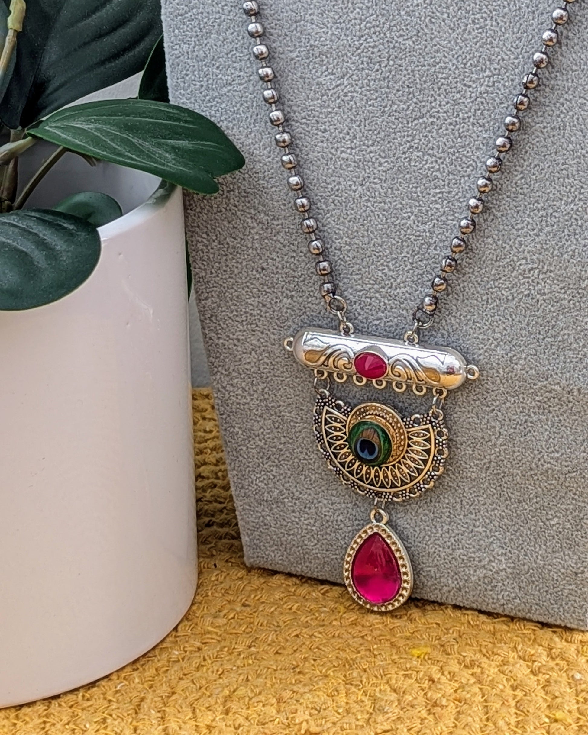 A long oxidized silver necklace with a statement peacock color design and matching earrings. Pick-up in Ajax Ontario. Worldwide shipping available. Perfect for weddings, festival jewelry, indian Jewelry, kids jewelry, kundan jewelry, gifting, costume jewelry, fashion jewelry, Eid, onam, Diwali, karwachauth, navratri. Free shipping available. Jewelry for women. Indian jewelry in ajax toronto Canada