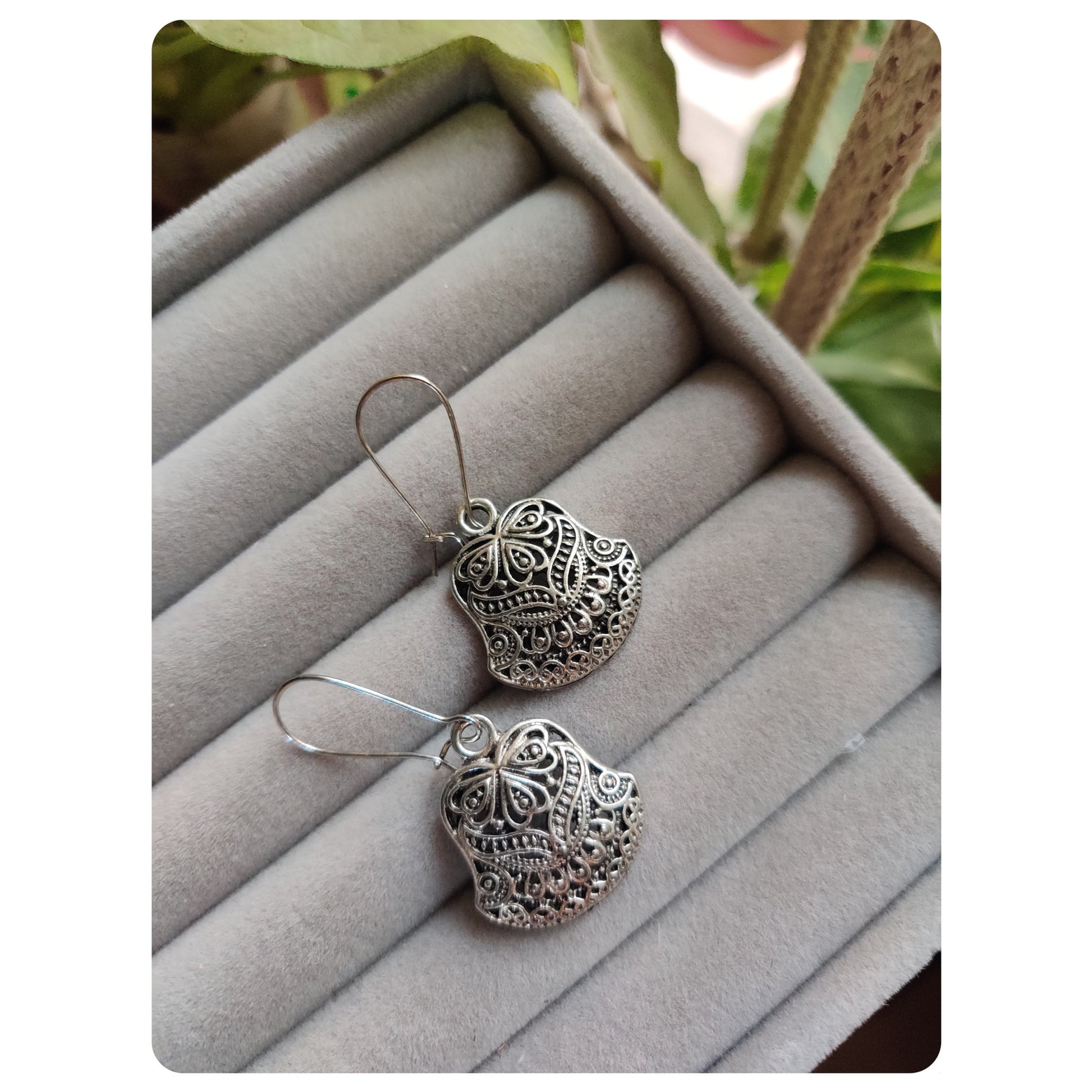 A pair of silver-toned small bell earrings. Pick-up in Ajax Ontario. Worldwide shipping available. Perfect for wedding, festival jewelry, indian Jewelry, kids jewelry, kundan jewelry, gifting, costume jewelry, fashion jewelry, Eid, onam, Diwali, karwachauth, navratri. Free shipping available. Jewelry for women. Indian jewelry in ajax durham region.