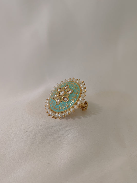 Golden kundan ring with green shouts royal