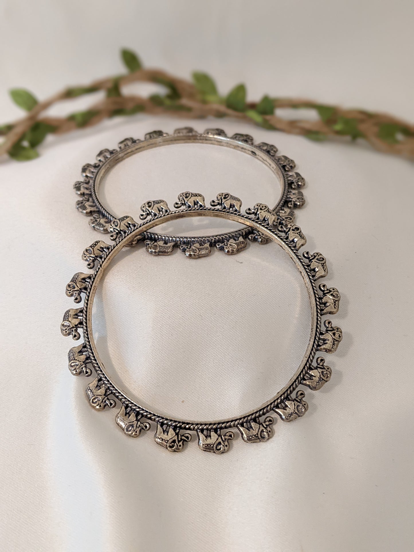 oxidized silver bangles, oxidized silver jewelry, indian jewelry, jewelry for women, bangles, bangles for women, indian bangles, casual bangles, silver bangles. Oxidized silver bangles with baby elephant design. Comes in a pair of 2, size 2.6"