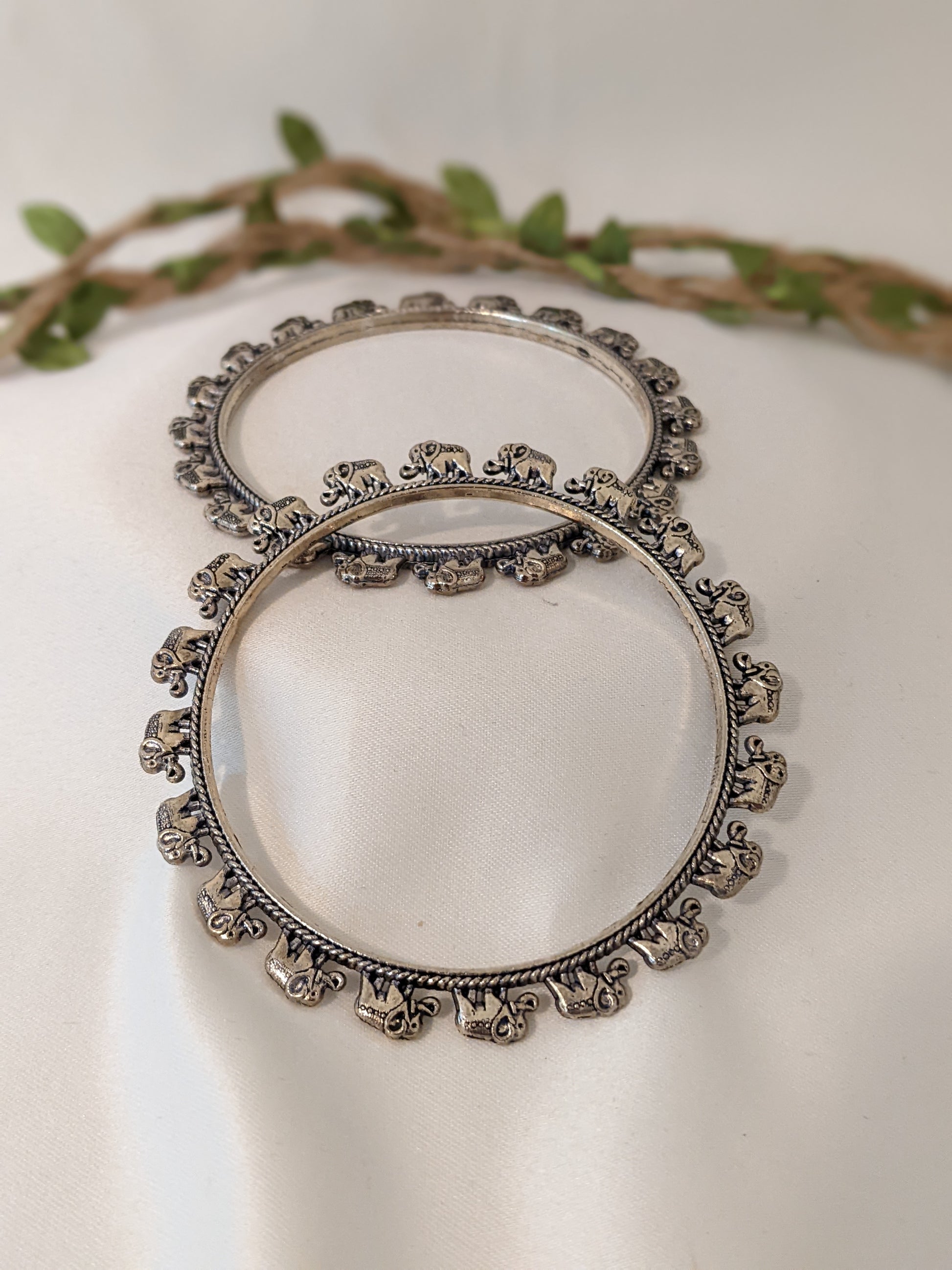 oxidized silver bangles, oxidized silver jewelry, indian jewelry, jewelry for women, bangles, bangles for women,  indian bangles, casual bangles, silver bangles. Oxidized silver bangles with baby elephant design. Comes in a pair of 2, size 2.6"