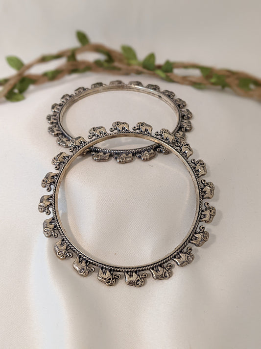 oxidized silver bangles, oxidized silver jewelry, indian jewelry, jewelry for women, bangles, bangles for women,  indian bangles, casual bangles, silver bangles. Oxidized silver bangles with baby elephant design. Comes in a pair of 2, size 2.6"