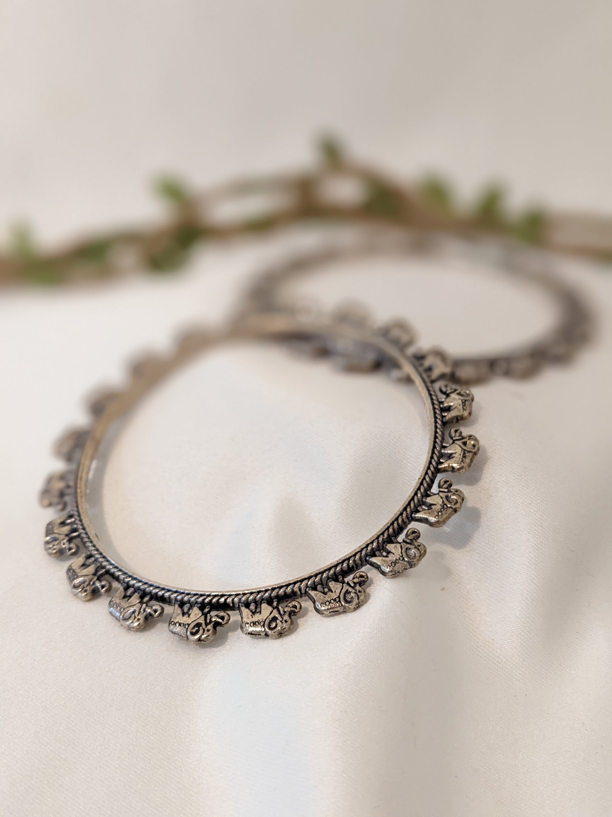 Oxidized silver bangles with baby elephant design. Comes in a pair of 2, size 2.6"