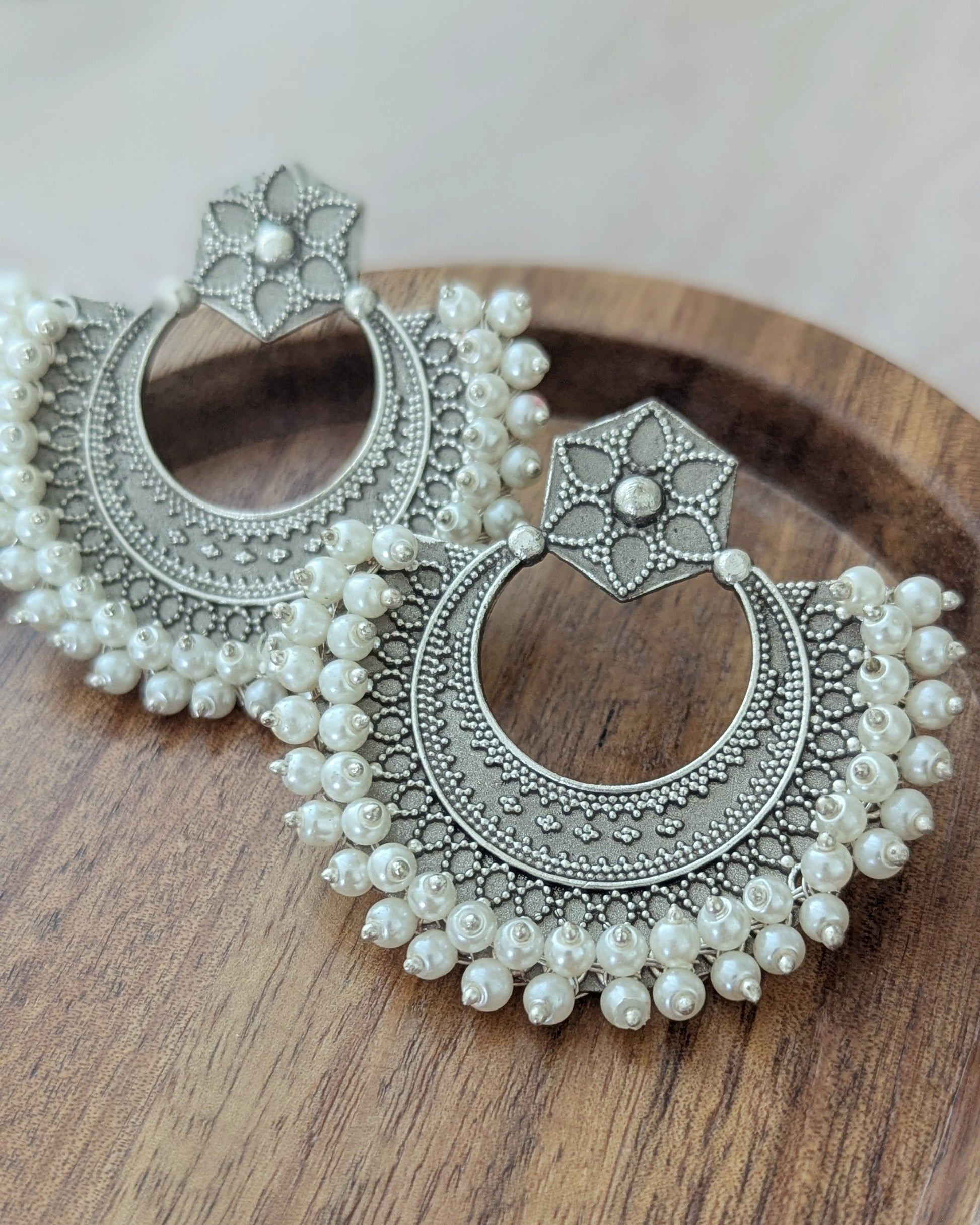 Premium and lightweight Chandbali earrings in oxidized silver with pearl detailing. Pick-up in Ajax Ontario. Worldwide shipping available. Perfect for wedding, festival jewelry, indian Jewelry, kids jewelry, kundan jewelry, gifting, costume jewelry, fashion jewelry, Eid, onam, Diwali, karwachauth, navratri. Free shipping available. Jewelry for women.