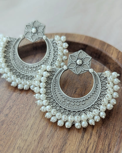 Premium and lightweight Chandbali earrings in oxidized silver with pearl detailing. Pick-up in Ajax Ontario. Worldwide shipping available. Perfect for wedding, festival jewelry, indian Jewelry, kids jewelry, kundan jewelry, gifting, costume jewelry, fashion jewelry, Eid, onam, Diwali, karwachauth, navratri. Free shipping available. Jewelry for women.