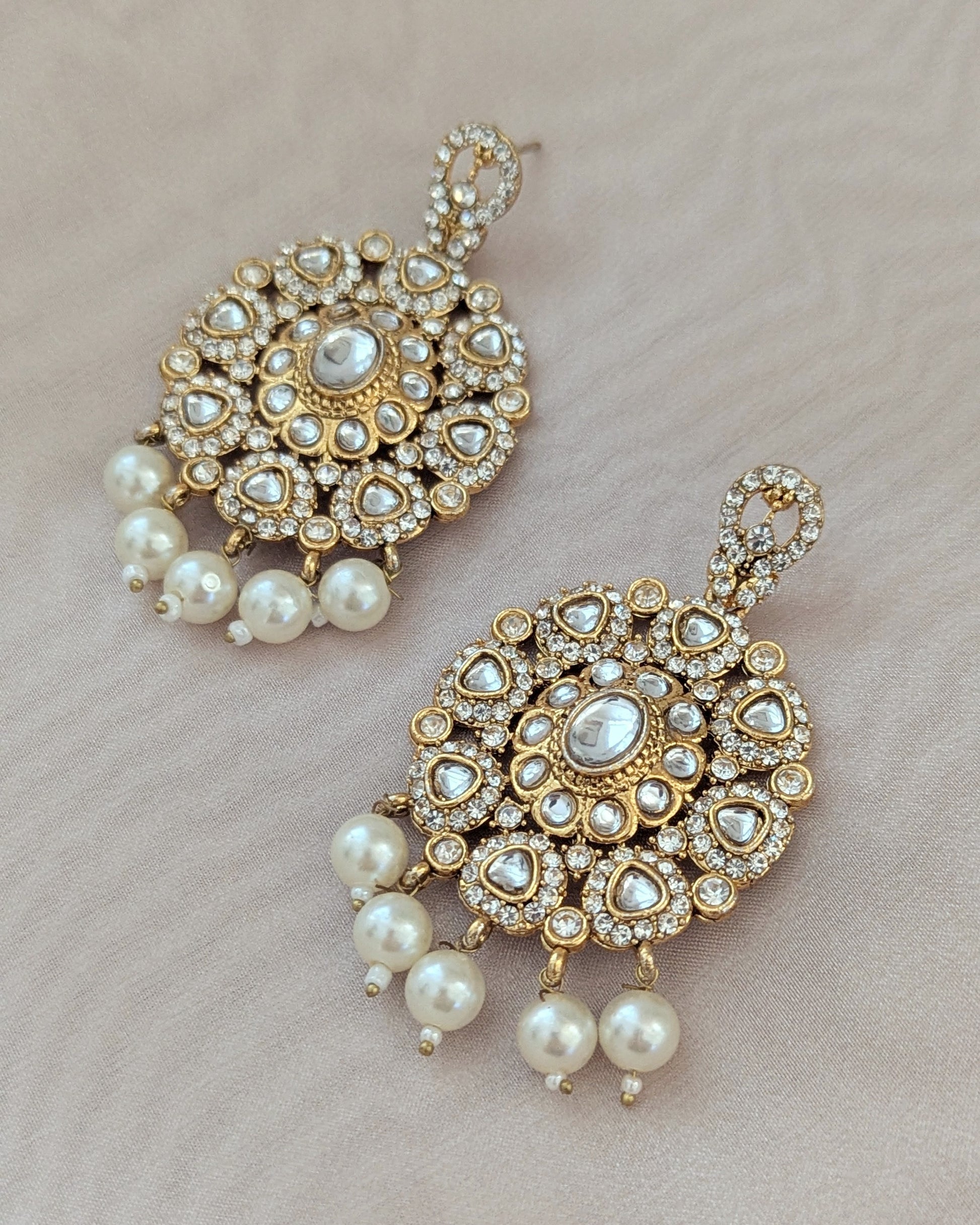 Premium Chandbali earrings in golden with stones and pearl detailing. Pick-up in Ajax Ontario. Worldwide shipping available. Perfect for wedding, festival jewelry, indian Jewelry, kids jewelry, kundan jewelry, gifting, costume jewelry, fashion jewelry, Eid, onam, Diwali, karwachauth, navratri. Free shipping available. Jewelry for women.