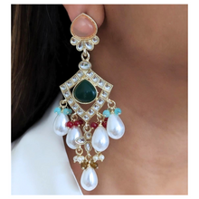 Load image into Gallery viewer, Elevate any ensemble with this luxurious multicolored necklace that adds an element of refinement and sophistication. Statement necklace with pearls &amp; green stones, comes with matching earrings and tikka.
