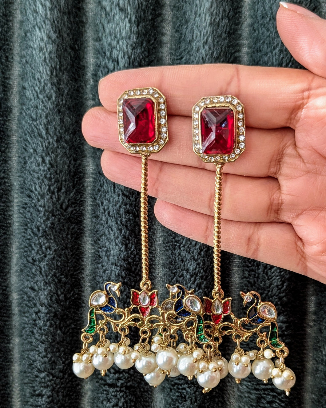 Beautiful bird design statement earrings in red, green color with white pearls. Perfect to match with any outfit or wear it as a contrast to a different color. Now available at Sufna Canada Ajax Ontario Toronto GTA