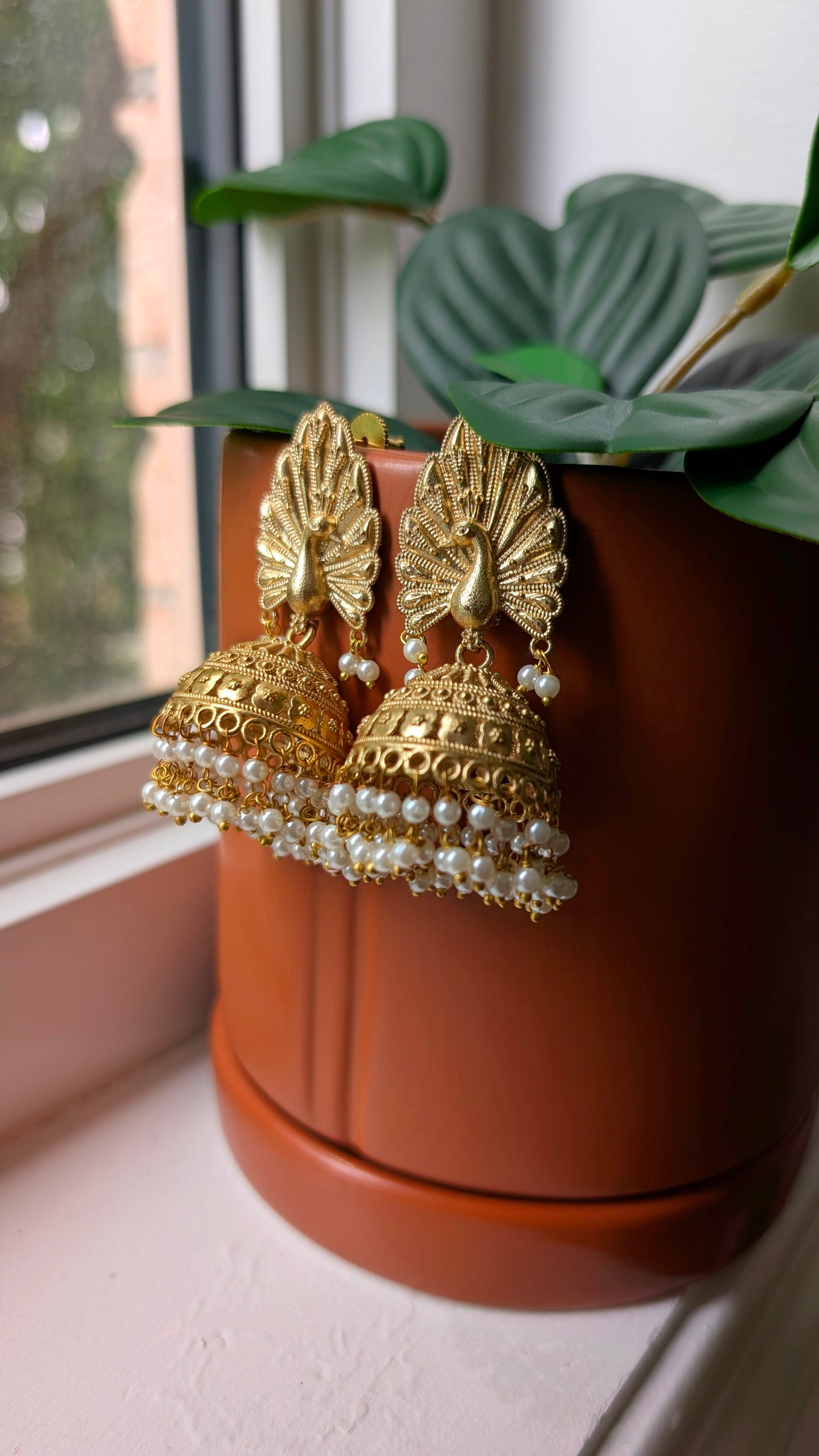 Dharna Oxidized Golden Peacock Jhumka
