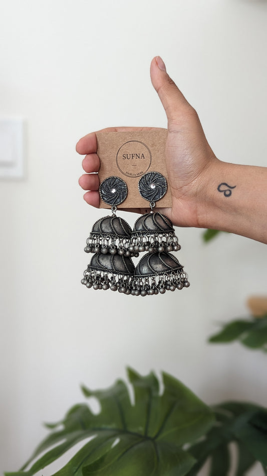 Make a bold statement with these silver chunky double layer oxidized silver jhumkas.