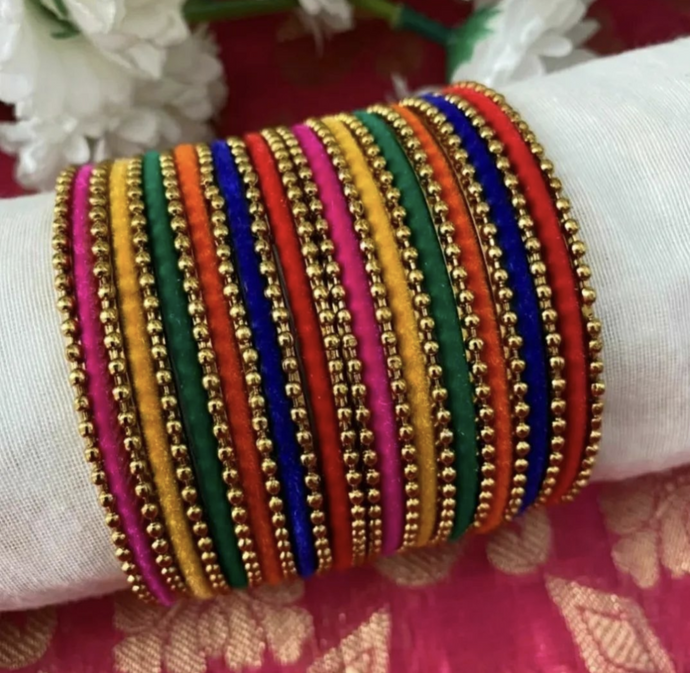 Set of beautiful Multicolored velvet bangles. Comes in two size options.