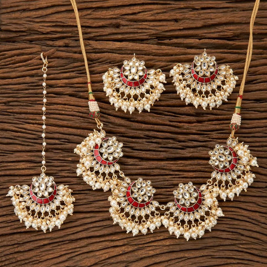 Statement red choker/chokar necklace with matching earrings and tikka. Pick-up in Ajax Ontario. Worldwide shipping available. Perfect for wedding, festival jewelry, indian Jewelry, kids jewelry, kundan jewelry, gifting, costume jewelry, fashion jewelry, Eid, onam, Diwali, karwachauth, navratri. Free shipping available. Jewelry for women.