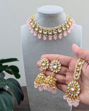 Load image into Gallery viewer, Beautiful small sized necklace in pink/baby pink with kundan design and small pearls. Comes with matching pink earrings and a tikka. Available at Sufna Canada in Ajax, Durham
