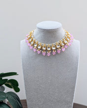 Load image into Gallery viewer, Beautiful small sized necklace in purple color with kundan design and small pearls. Comes with matching pink earrings and a tikka. Available at Sufna Canada in Ajax, Durham
