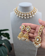 Load image into Gallery viewer, Beautiful small sized necklace in white with kundan design and small pearls. Comes with matching pink earrings and a tikka. Available at Sufna Canada in Ajax, Durham
