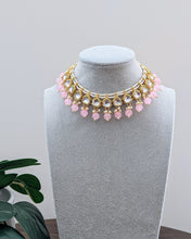 Load image into Gallery viewer, Beautiful small sized necklace in pink/baby pink with kundan design and small pearls. Comes with matching pink earrings and a tikka. Available at Sufna Canada in Ajax, Durham
