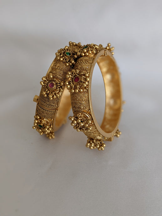 Antique & timeless antique finish golden bangles. Available in size 2.4 only.