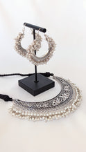Load image into Gallery viewer, Add a touch of elegance to your outfit with this silver oxidized choker. Beautiful pearl drop silver necklace and comes with a pair of earrings
